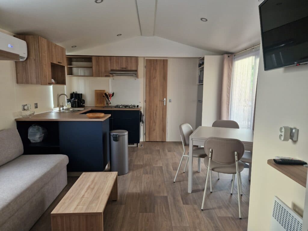 Woonkamer van de mobile home Maison Patriaul in Cap d'Agde